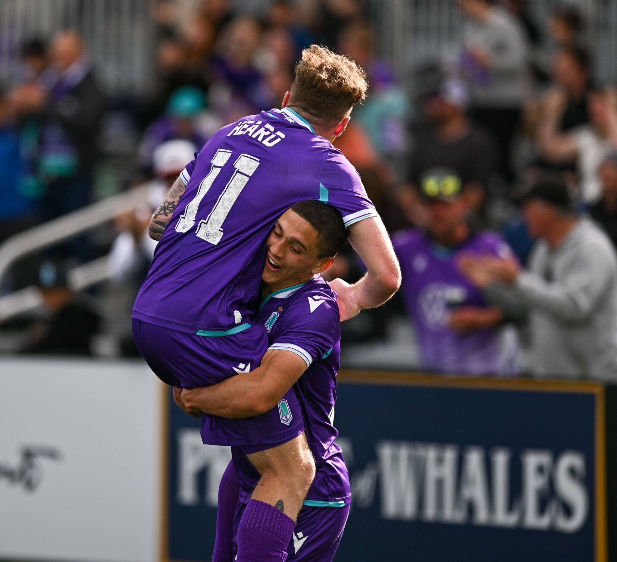 Josh Heard celebrates with Manny Aparicio after scoring the winning goal against FC Edmonton at Starlight Stadium on May 14. (Simon Fearn/Black Press Media)