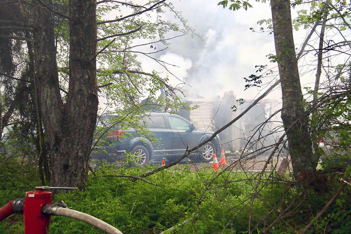 A home on Church Road was destroyed in a fire the afternoon and early evening of Monday, May 16. There were no serious injuries in the blaze, said RCMP. (Duck Paterson photo)