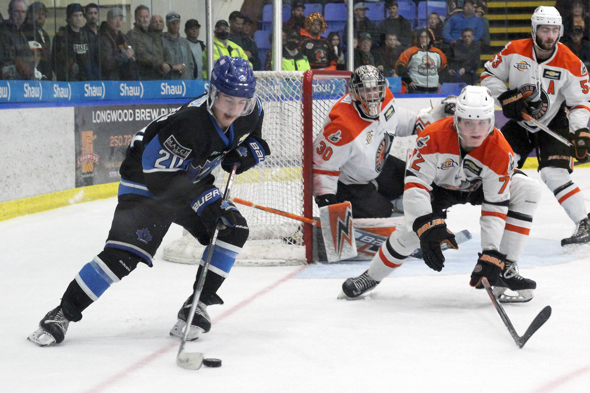 Penticton Vees player Josh Nadeau carries the puck in the attacking zone as Nanaimo Clippers player Brett Merner defends on the play during Game 3 of the BCHL finals on Tuesday, May 17, at Nanaimo’s Frank Crane Arena. (Greg Sakaki/Black Press Media)