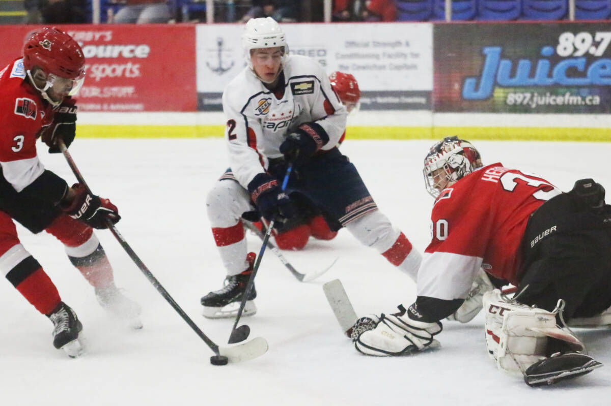 Cowichan Valley Capitals forward David Jacobs moves in on goaltender Hobie Hedquist. (Kevin Rothbauer/Citizen)