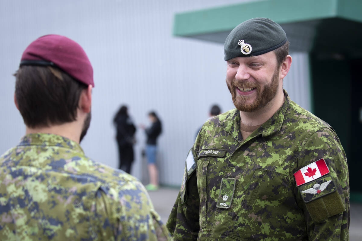 Maj. Ryan Pridmore of Princess Patricia’s Canadian Light Infantry speaks to members deployed on Task Force Poland supporting Ukrainian refugees in Warsaw, Poland on May 14, 2022. (Cpl. Tori Lake Canadian Armed Forces photo)