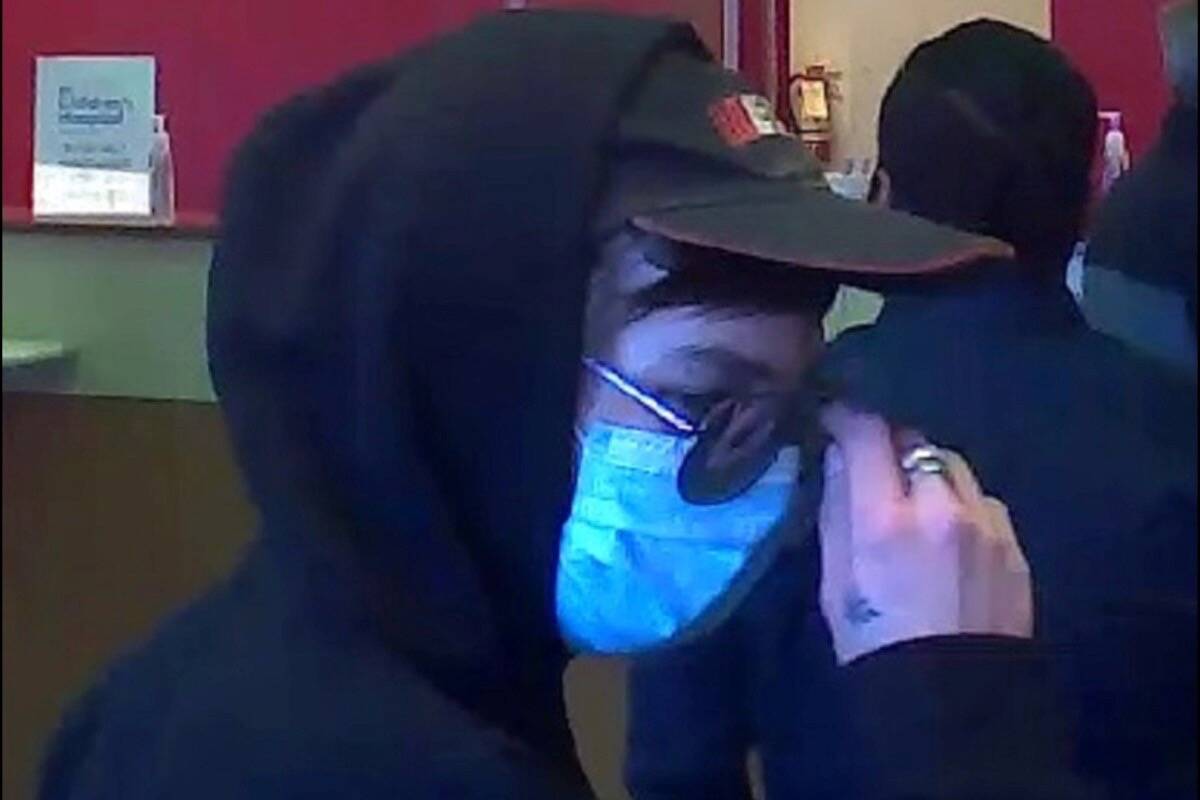 A surveillance photo of a suspect in a reported robbery at CIBC in Parksville on May 19. (Submitted photo)