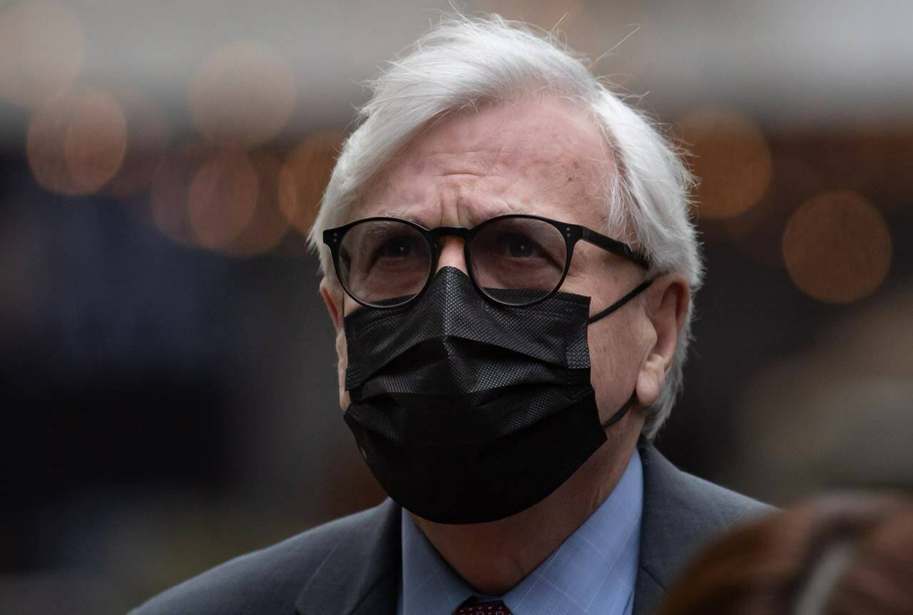 Craig James, former clerk of the B.C. legislative assembly, arrives back at B.C. Supreme Court after a break from his trial, in Vancouver, on Tuesday, March 1, 2022. THE CANADIAN PRESS/Darryl Dyck