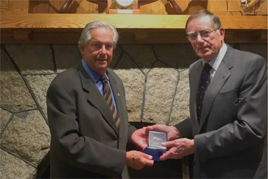 Barry Gough is presented with the Admirals Medal by retired naval admiral John Anderson on behalf of the Naval Association of Canada during a monthly luncheon of the Vancouver Island branch at the Royal Victoria Yacht Club. (Photo by Paul Seguna)