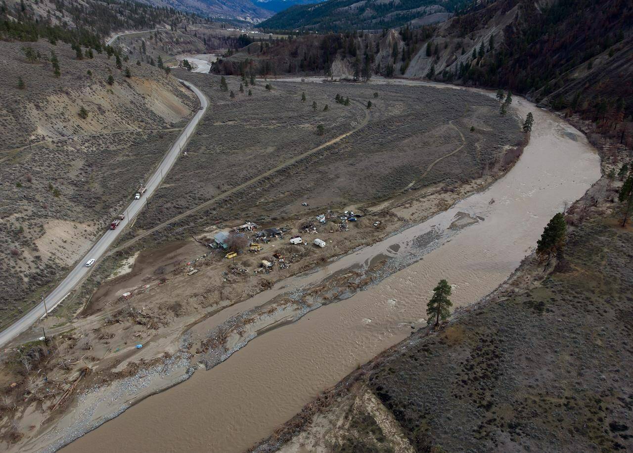 A property affected by November flooding of the Nicola River is seen along Highway 8 on the Shackan Indian Band, northwest of Merritt, B.C., Thursday, March 24, 2022. British Columbia officials are closing some roadways as forecasted heavy rainfall and warming weather increases the risk of flooding in parts of the province’s north and Interior. THE CANADIAN PRESS/Darryl Dyck