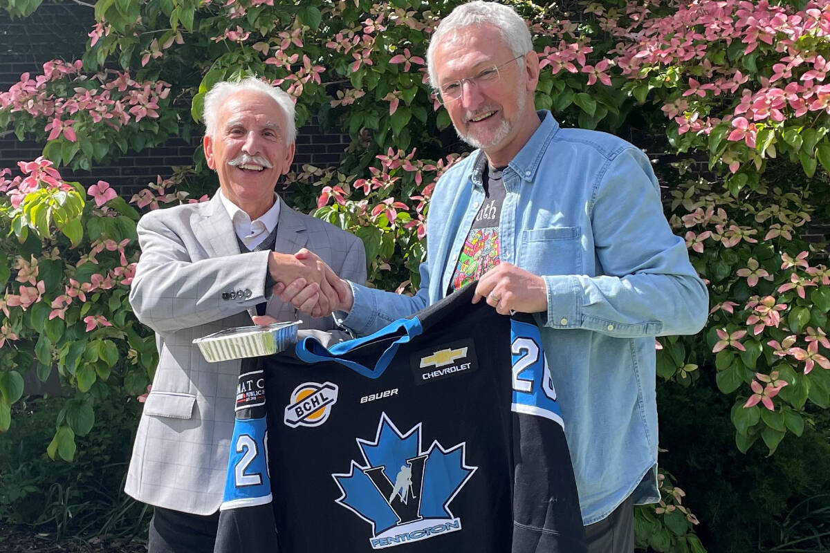 John Vassilaki and Leonard Krog, the mayors of Penticton and Nanaimo, respectively, put a wrap on their friendly wager on the B.C. Hockey League Finals in front of Penticton’s City Hall. (Photo- City of Penticton Facebook)