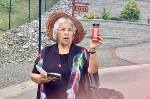 Florence James blesses the trail network with red earth. (Photo by Pete Cavanaugh)
