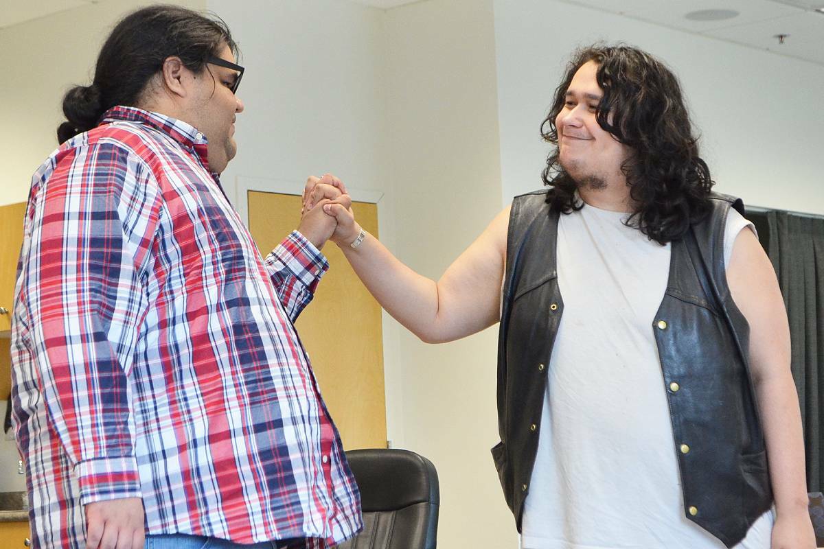 Damon Mitchell, left, and Dan Puglas rehearse at the Nanaimo Harbourfront Library on June 9 for Reconciliation Theatre’s inaugural production ‘True West’ by Sam Shepard. (Mandy Moraes/News Bulletin)