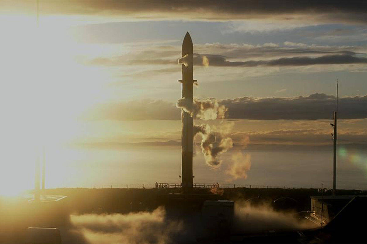 In this photo released by Rocket Lab, Rocket Lab’s Electron rocket sits on the launch pad on the Mahia peninsula in New Zealand on May 17, 2022. NASA plans to send up a satellite to track a new orbit around the moon which it hopes to use in the coming years to once again land astronauts on the lunar surface. (Rocket Lab via AP)