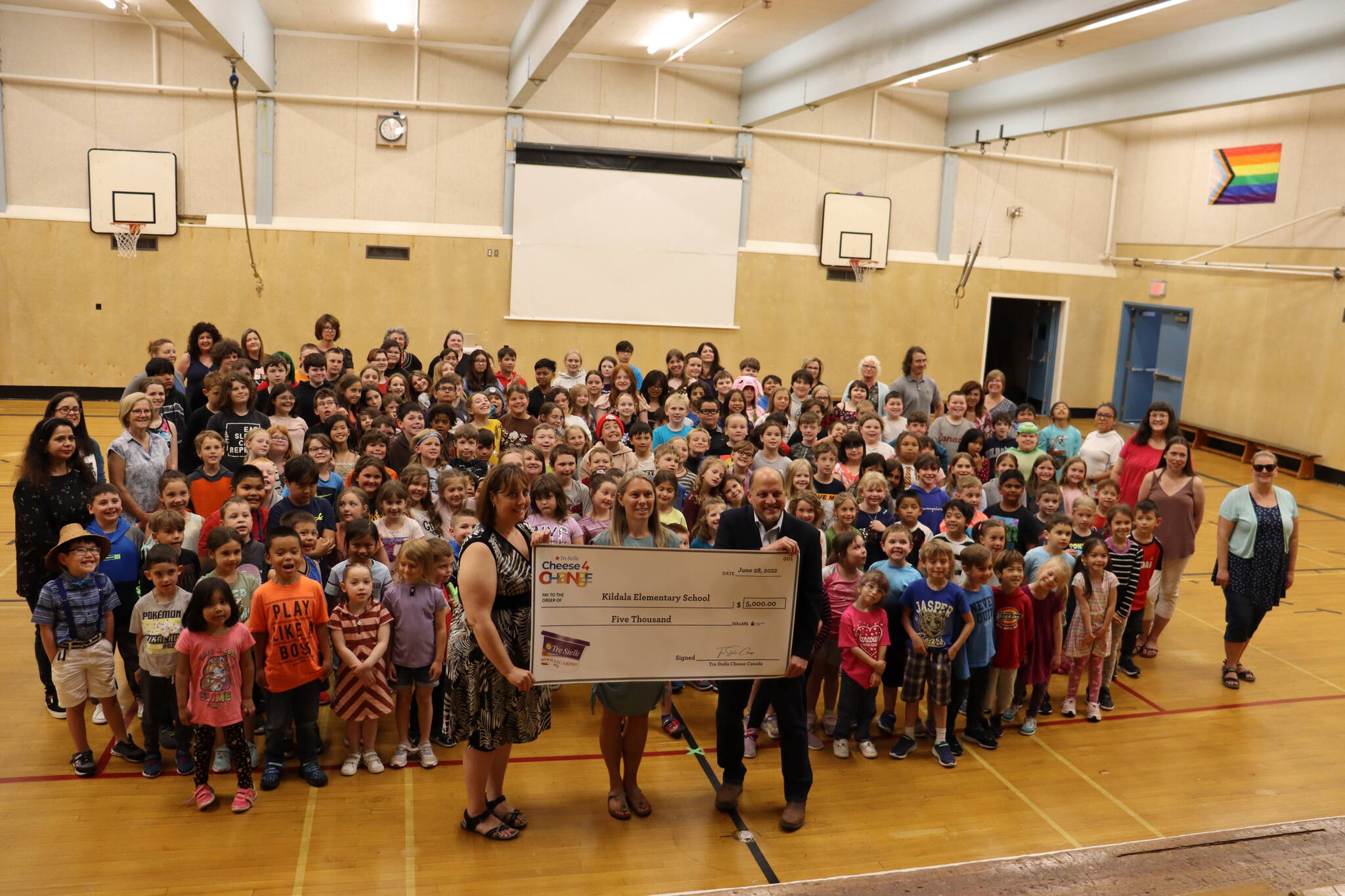 Kitimat Mayor Phil Germuth presented the cheque to Kildala Elementary School from Cheese4Change. (Kitimat Northern Sentinel/Christian Apostolovski)
