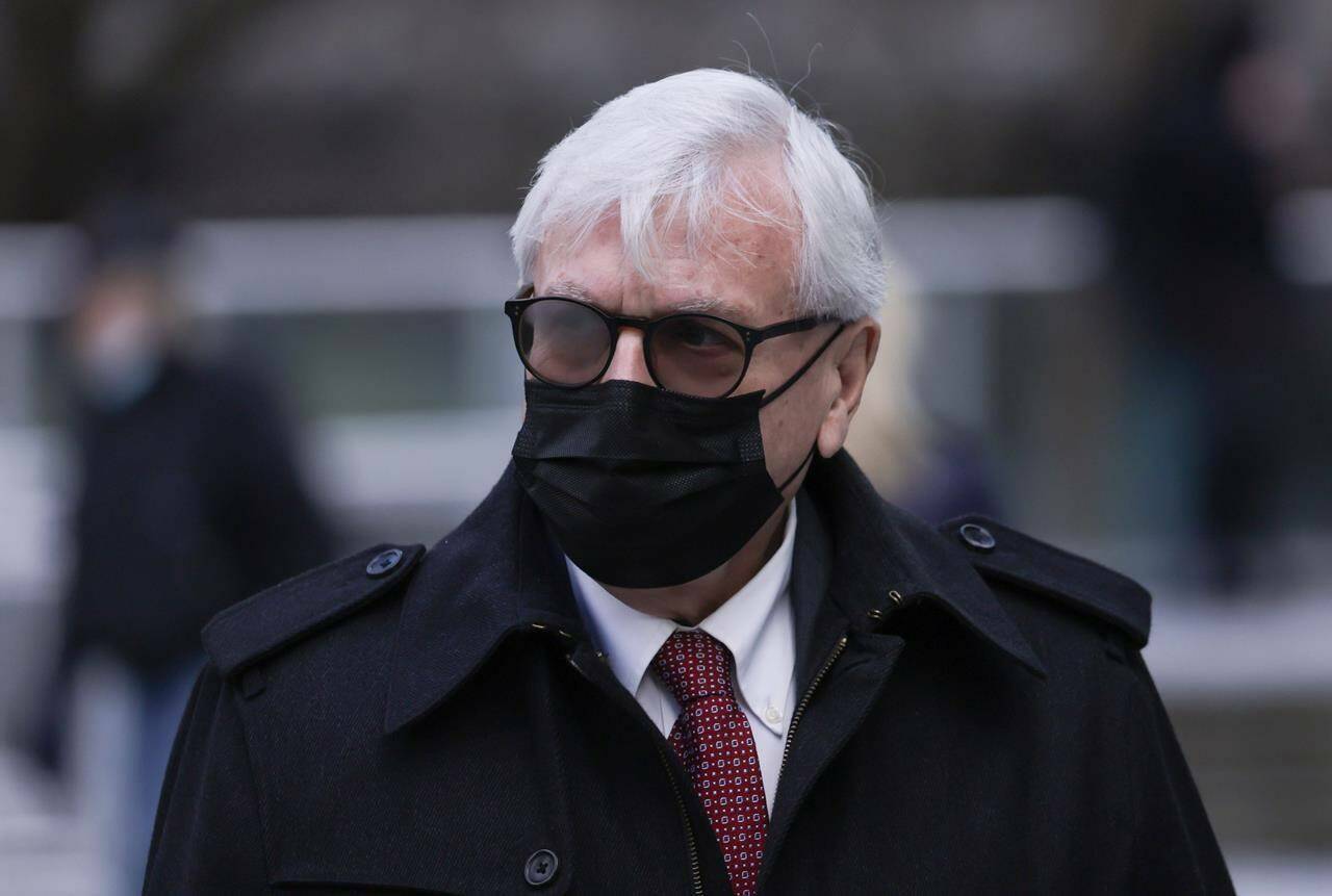 Craig James, former clerk of the B.C. legislature, leaves B.C. Supreme Court on Jan. 26, 2022. THE CANADIAN PRESS/Darryl Dyck
