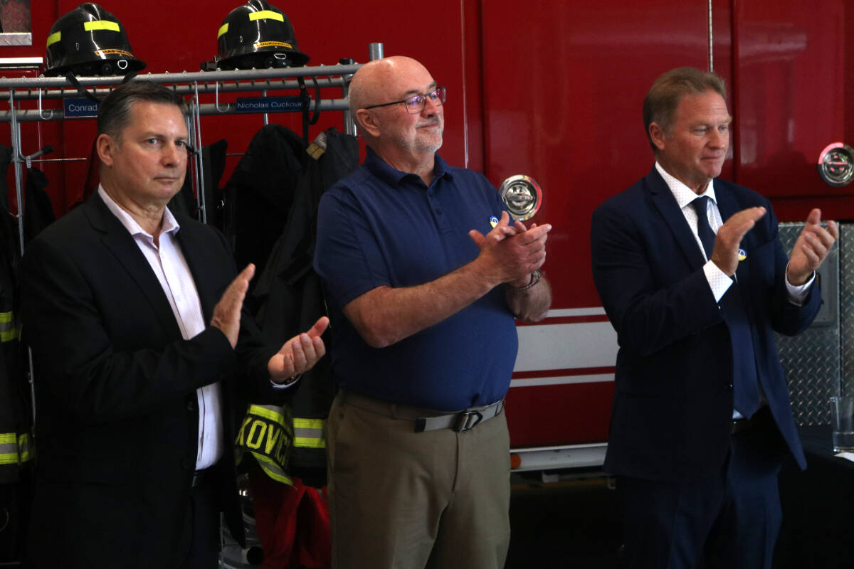 From left to right, Shawn Carby, a volunteer with GlobalMedic, Bob Beckett, Sooke School District board vice-chair, and Langford Mayor Stew Young. (Bailey Moreton/News Staff)