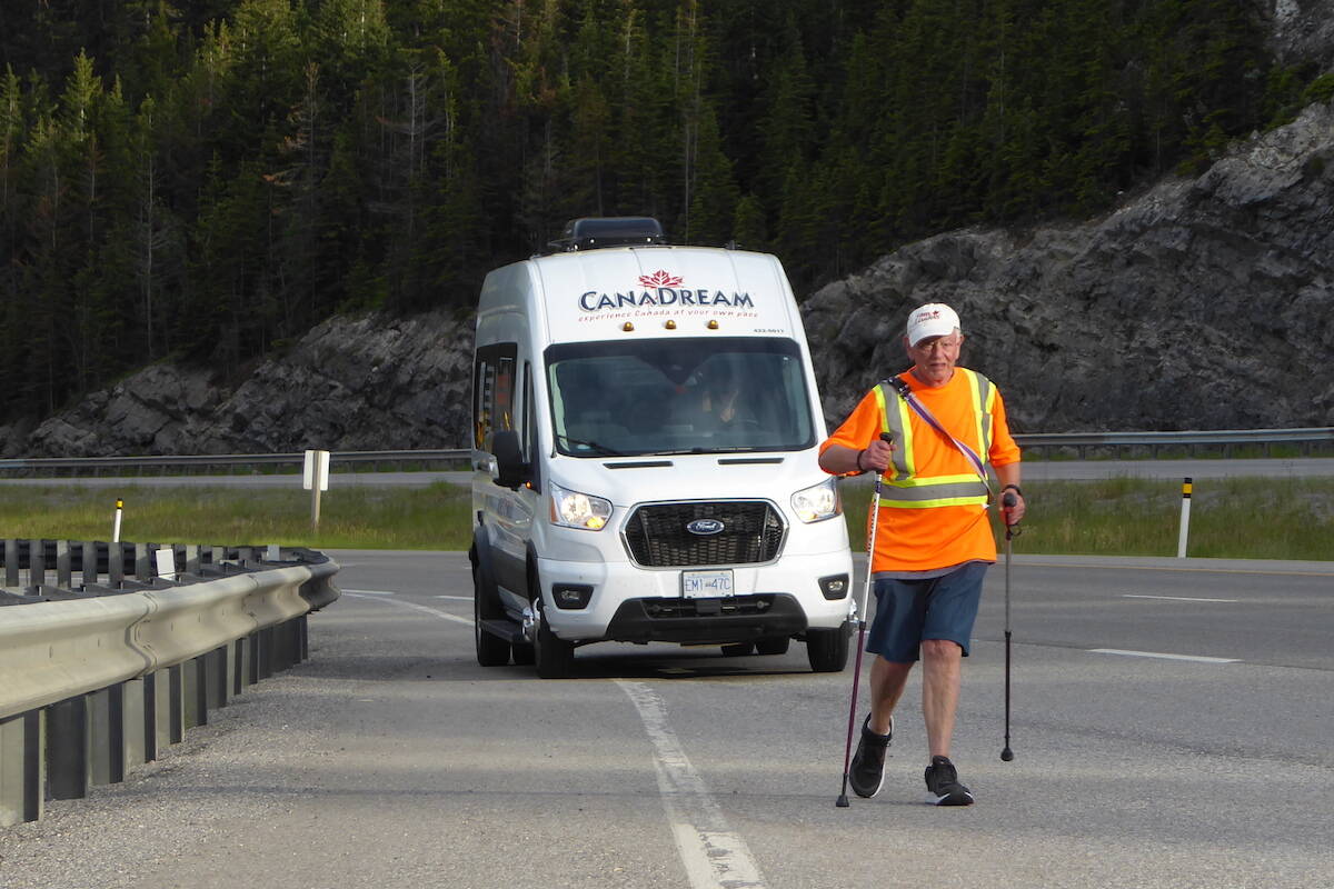 Gary Averbach striding down the side of the highway on Bob’s Walk For Cancer Research. (Contributed by Gary Averbach)