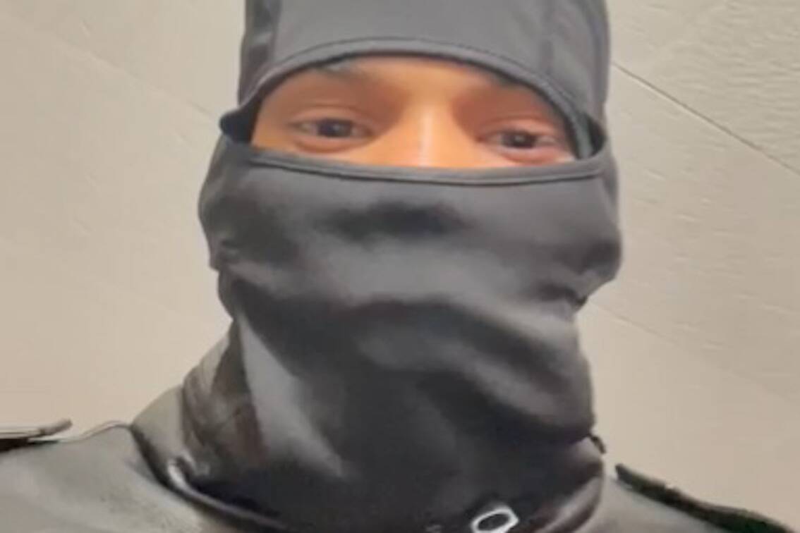 Image used in a blackmail attempt, showing a person in a grey ski mask. (Burnaby RCMP photo)