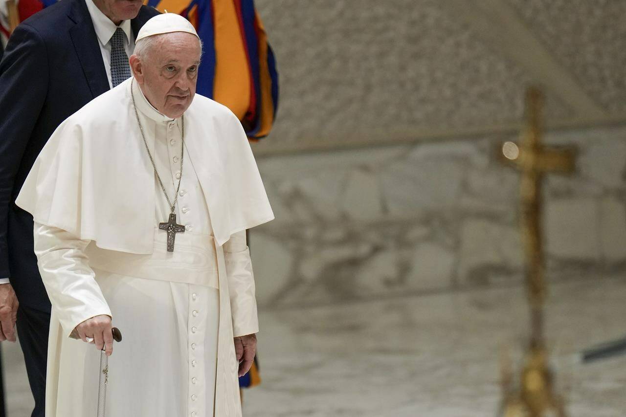 Pope Francis arrives for a meeting with members of the Neocatechumenal Way community, in the Pope Paul VI hall at the Vatican, Monday, June 27, 2022. THE CANADIAN PRESS/AP, Alessandra Tarantino