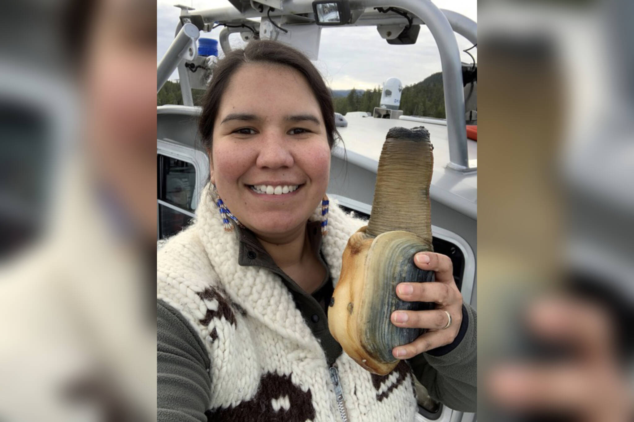 Desiree Lawson, MaPP Implementation Coordinator, Central Coast Indigenous Resource Alliance with a geoduck. Photo courtesy North Island College