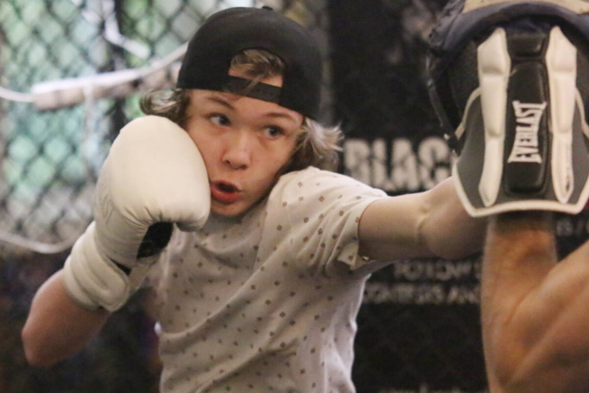 Codey Manley spars with coach Shane Jung at Black Box MMA in Duncan. (Kevin Rothbauer/Citizen)