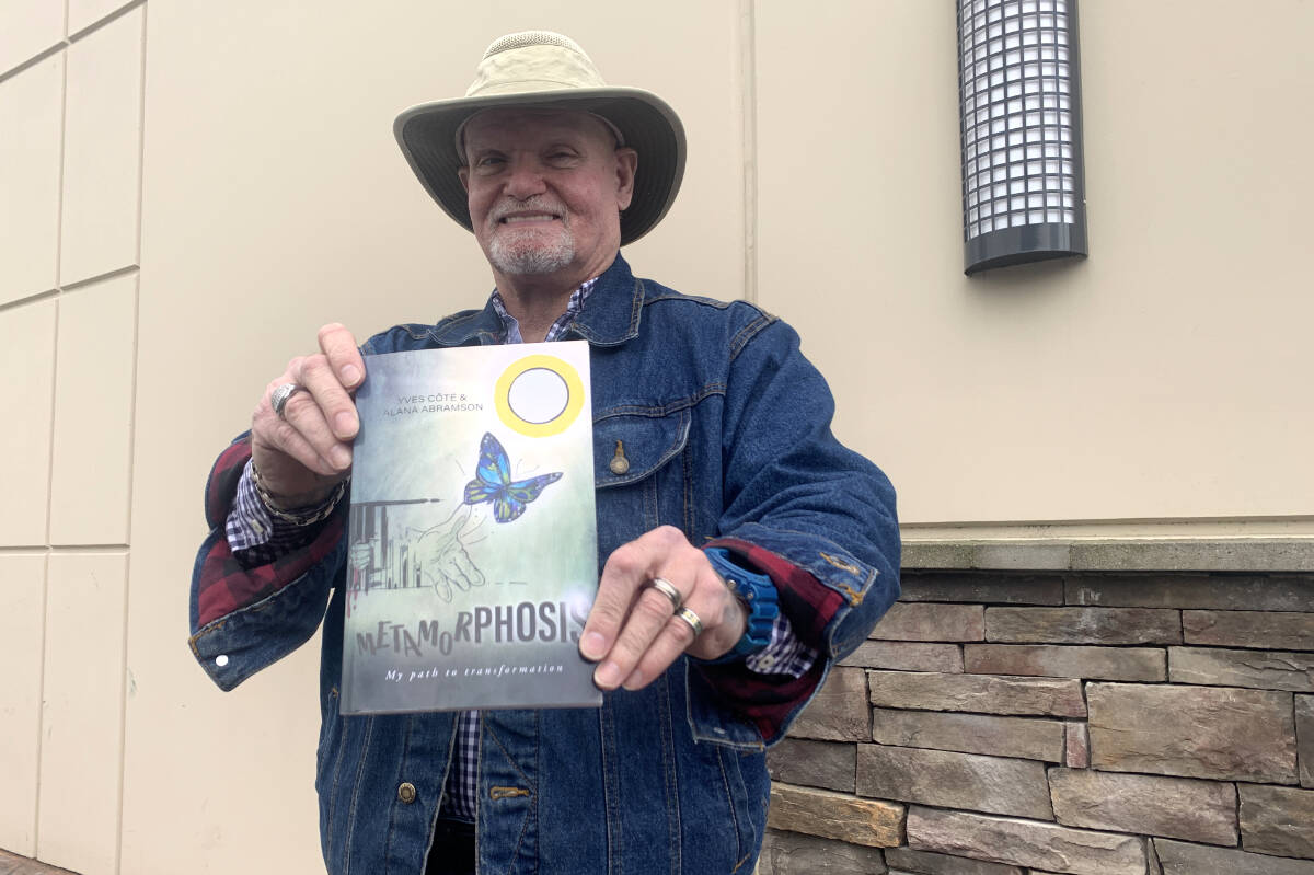 Yves Côté and the book he co-authored, Metamorphosis: My path to transformation. Côté spent 32 years behind bars for serious crimes including murder, but he says this book is meant to show that change is possible. (Paul Henderson/ Chilliwack Progress)