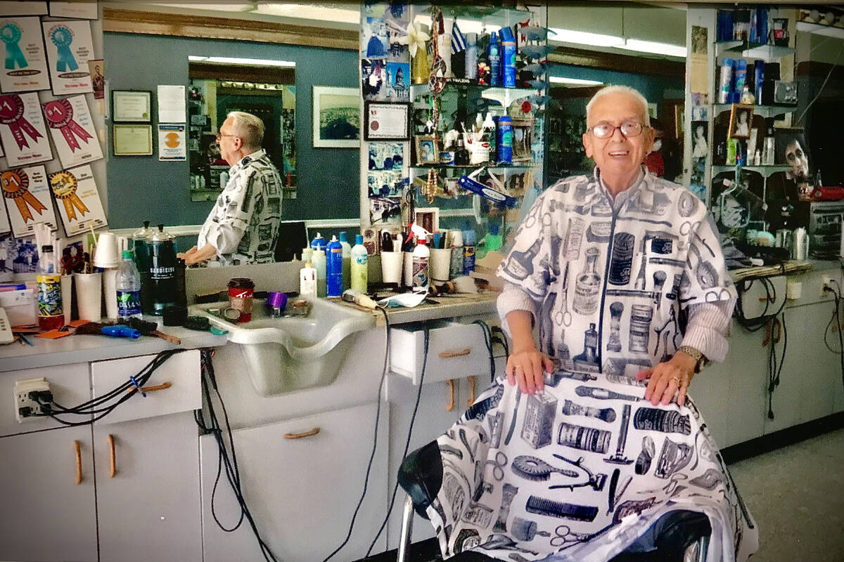 Jimmy Pavlidis of Jimmy’s Barber Shop is pictured at his Fort Street business. Pavlidis is Greater Victoria’s longest serving barber and has maintained a ’50s style and inexpensive haircuts at his shop. (Photo contributed)