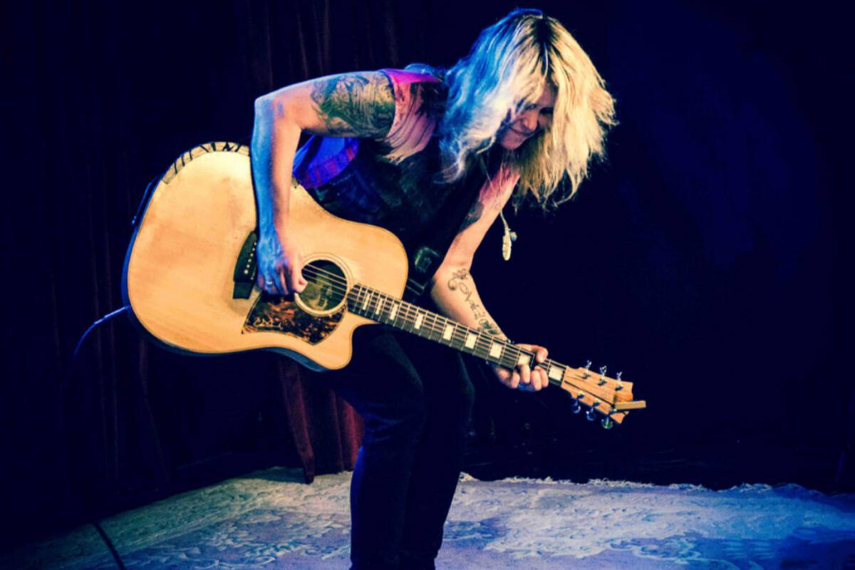 Musician Sarah Smith, who performs both as a solo acoustic artist and with her rock band, chose to relocate to the West Coast for its peaceful vibe and folk scene. (Photo by Lani Sanders)