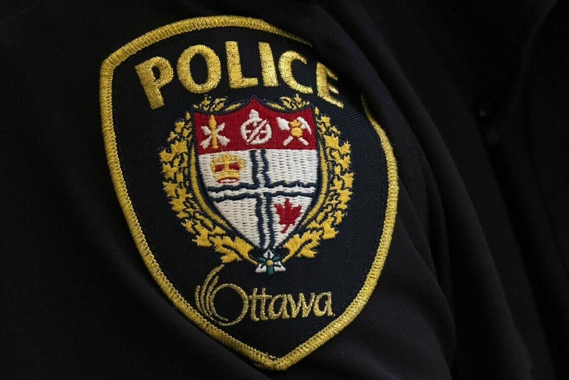 A close-up of an Ottawa Police officers badge is seen on Thursday, April 28, 2022 in Ottawa. A four-decade-old missing persons case has been resolved more than a year after the womans family made a renewed plea for information.THE CANADIAN PRESS/Adrian Wyld