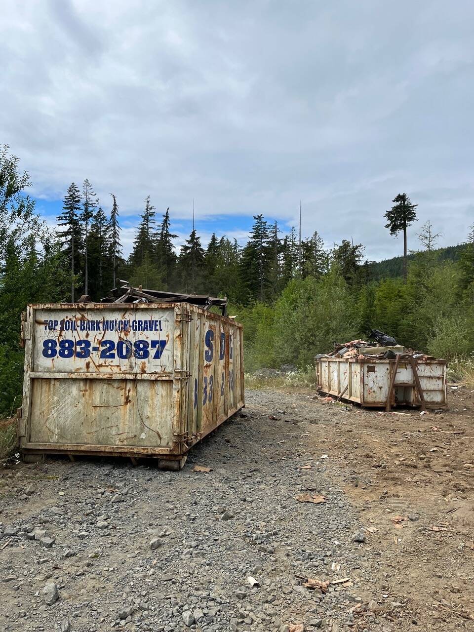 The Sooke ATV Club’s third annual environmental cleanup day on Aug. 13, hauling several large containers of waste out of the woods near Jordan River. (Contributed-Sooke ATV Club)
