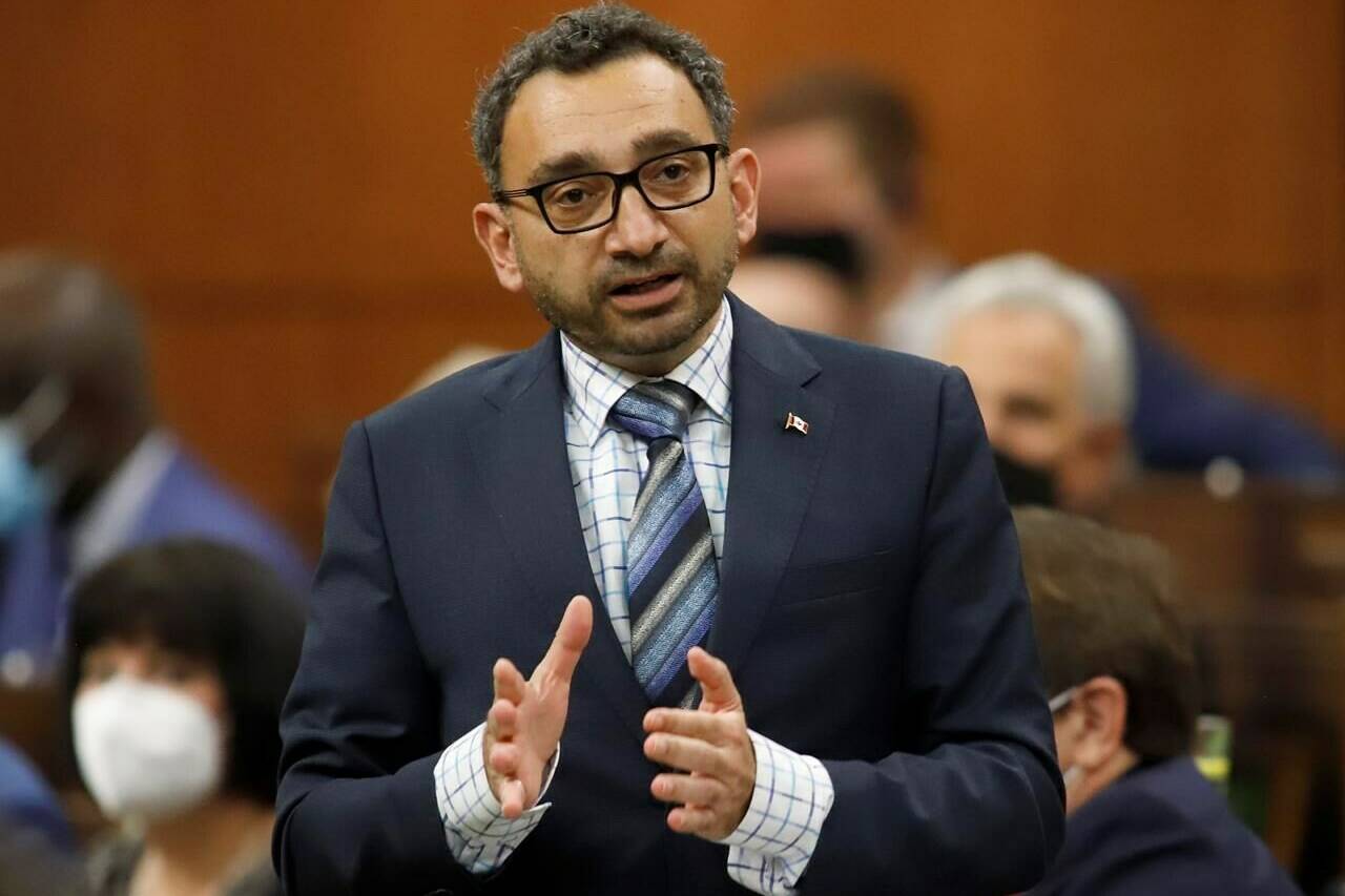 Omar Alghabra rises during Question Period in the House of Commons on Parliament Hill in Ottawa on Monday, June 20, 2022. The transport minister will testify today before the House of Commons transport committee on airport and airline delays that have wreaked havoc on travelers over the past several months.THE CANADIAN PRESS/ Patrick Doyle