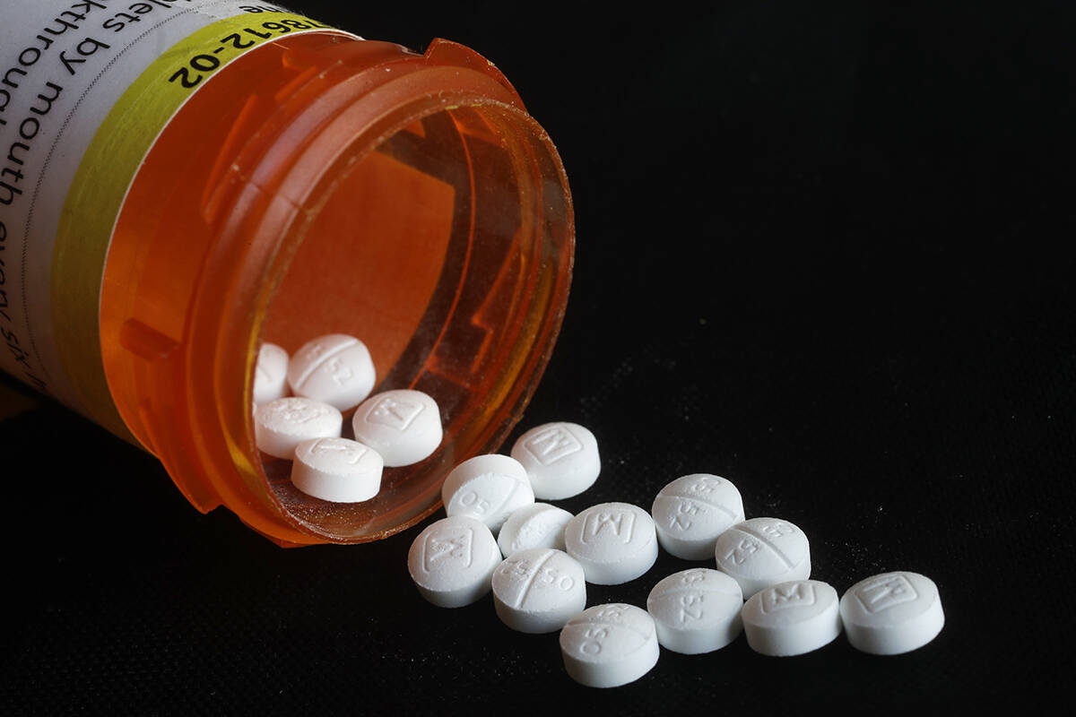 FILE - In this 2018 file photo, oxycodone pills are displayed in New York. (AP Photo/Mark Lennihan, File)