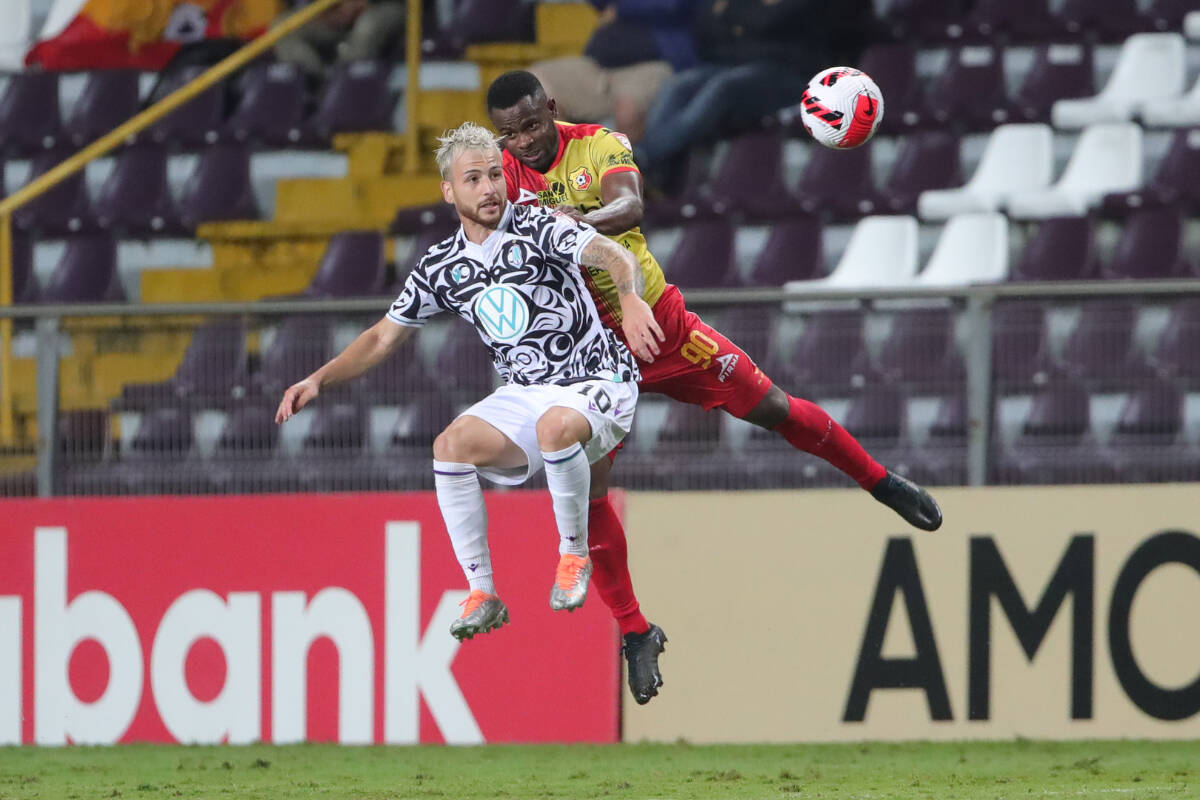 Pacific FC’s Marco Bustos jumps for the ball against C.S. Herediano in Costa Rica in the second leg of their round of 16 CONCACAF League tie on Aug. 23. (Courtesy of CONCACAF/STRAFFON IMAGES/JHON DURAN)