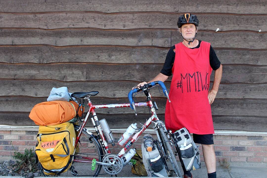 Edmonton resident Michael Kalmanovitch is wearing a red dress in a cycling journey down Hwy16 to highlight the cause of missing and murdered women. (Contributed photo)
