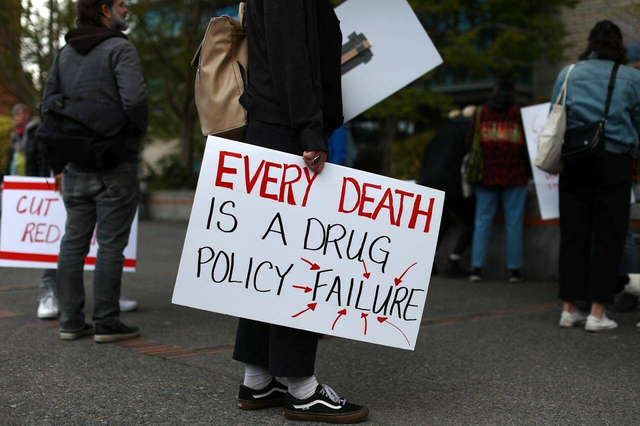 Moms Stop the Harm advocates and supporters gather at Centennial Square on the sixth anniversary of a public health emergency due to the opioid-related deaths across British Columbia, in Victoria on April 14, 2022. B.C. says it has suffered more than 10,000 overdose deaths since the province declared a public health emergency in April 2016. THE CANADIAN PRESS/Chad Hipolito