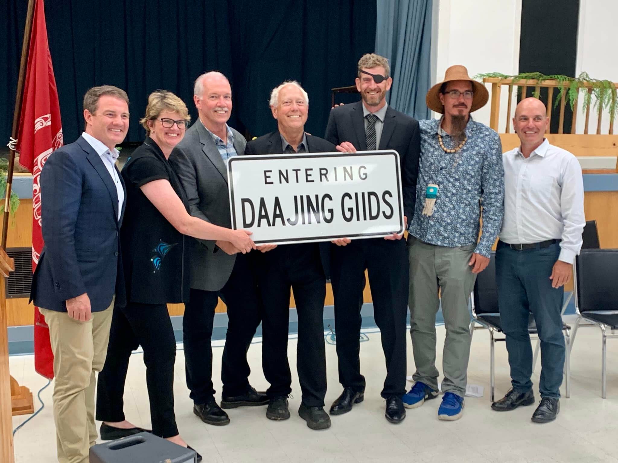 Left to right: Skeena– Bulkley Valley MP Taylor Bachrach, North Coast MLA Jennifer Rice, Premier John Horgan, Attorney General Murray Rankin, Daajing Giids Mayor Kris Olsen, Haida Nation Council president Gaagwiis (Jason Alsop) and Municipal Affairs minister Nathan Cullen. (Taylor Bachrach/Facebook)