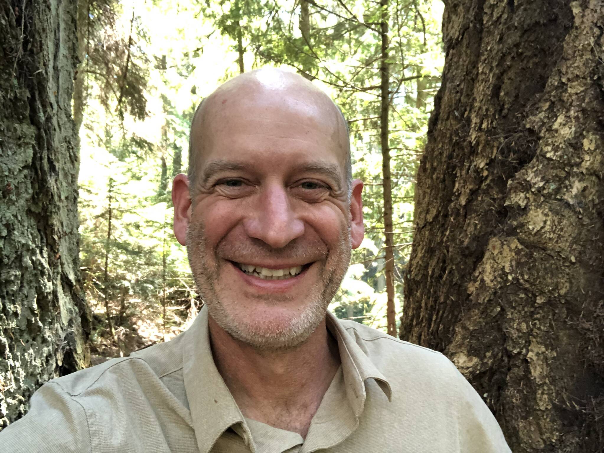 Author Bill Arnott, seen here in Qualicum Beach Heritage Forest, recently wrote ‘A Season on Vancouver Island’ with many references to the Parksville Qualicum Beach area. (Submitted photo)