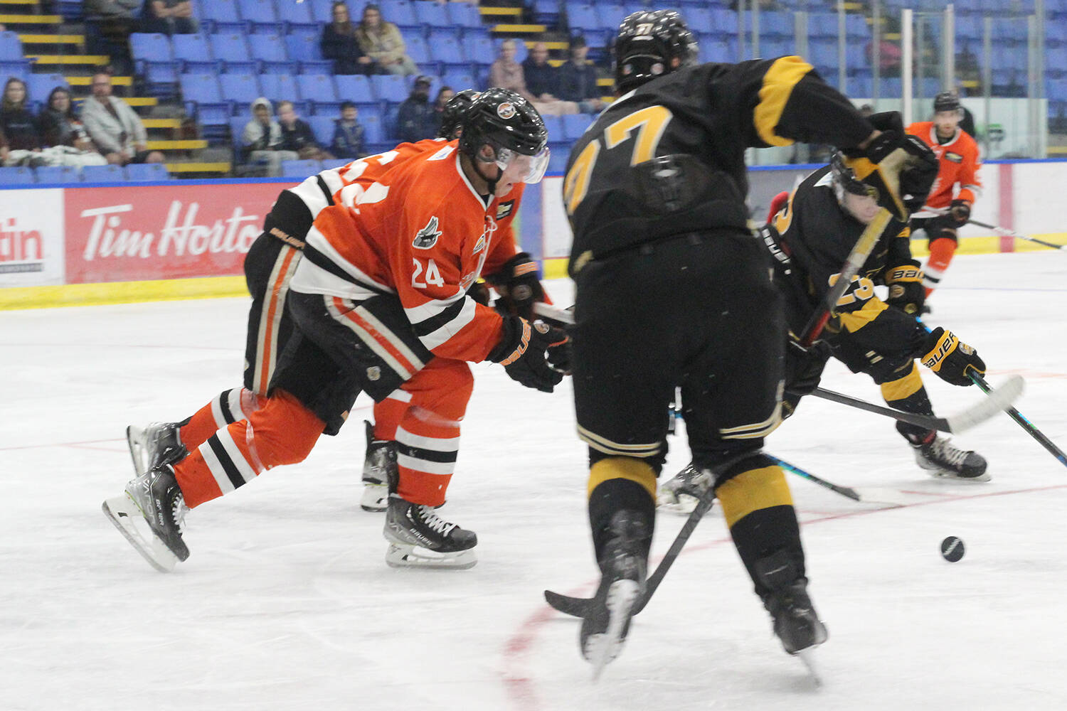 Nanaimo Clippers player Jake Hewitt races for the puck during a BCHL pre-season game against the Victoria Grizzlies on Saturday, Sept. 10, at Frank Crane Arena. (Greg Sakaki/News Bulletin)