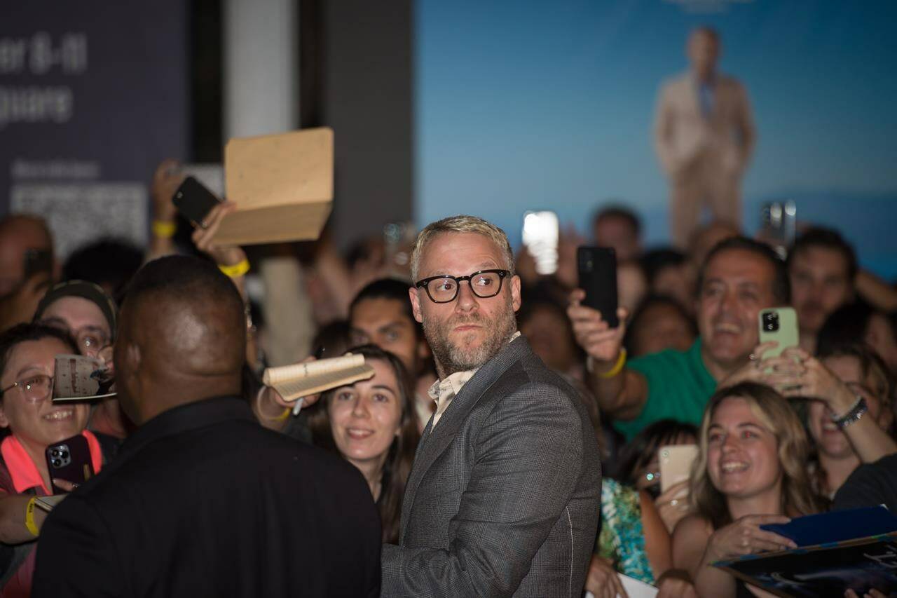 Actor Seth Rogen is photographed as he greats fans during the red carpet premier for the film, The Fabelmans, at Princess of Wales Theatre during the Toronto International Film Festival on Saturday, September 10, 2022. THE CANADIAN PRESS/Tijana Martin