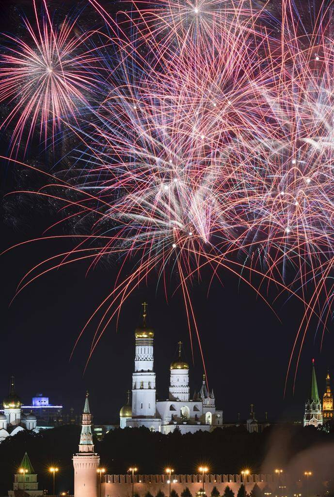 Fireworks explode over the Ivan the Great Bell Tower inside the Moscow Kremlin during the celebration of Moscow City Day in Moscow, Russia, Saturday, Sept. 10, 2022, for the 875th anniversary of the city’s founding. (AP Photo/Maxim Marmur)