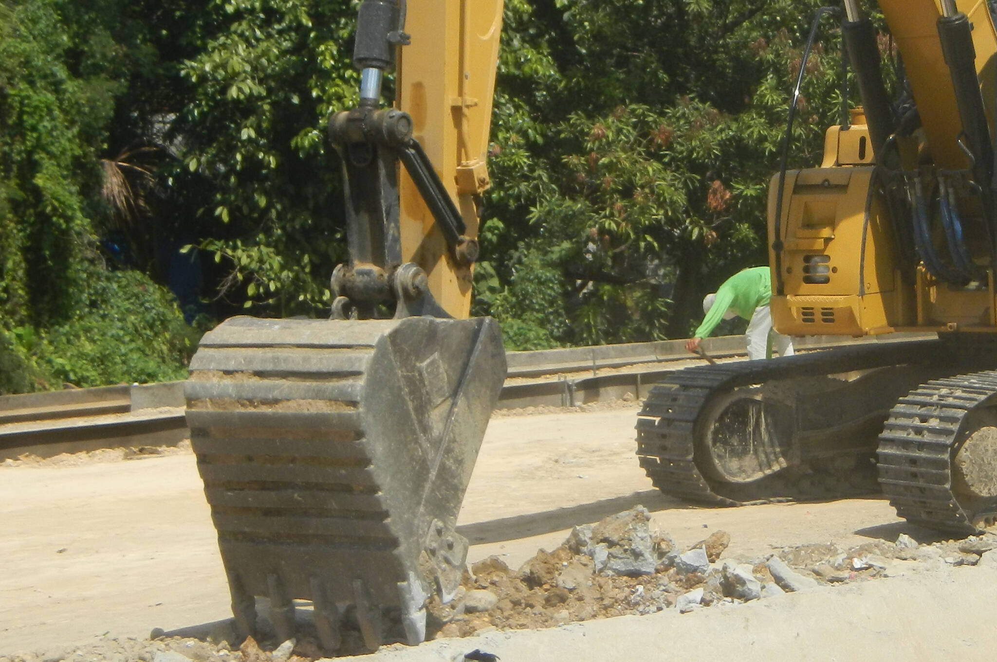 An excavator from a Wikimedia Commons file. GFL Environmental Inc. has been been handed a record WorksafeBC fine in connection with debris cleanup in the Kootenays. Wikimedia Commons file photo