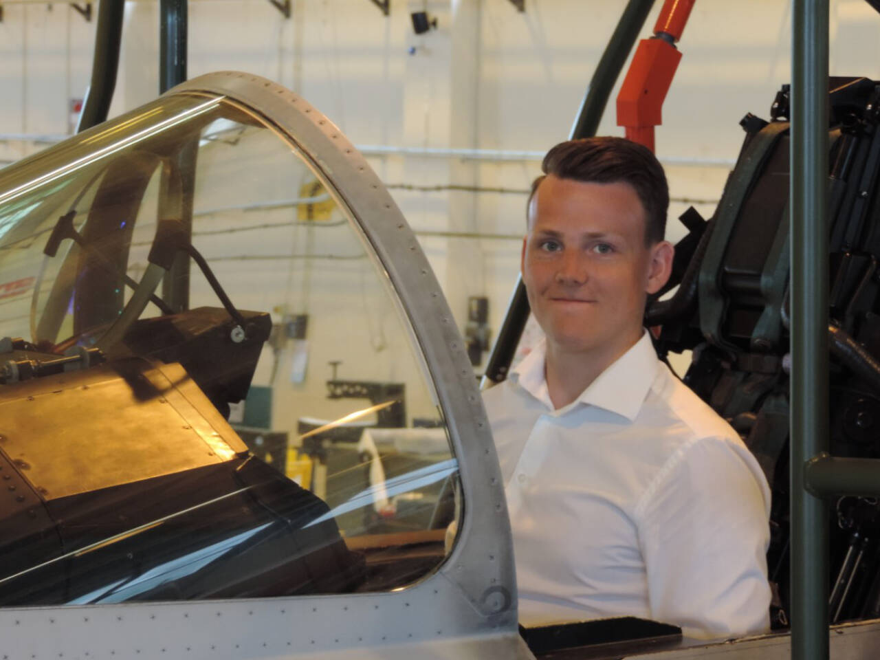 Alexander Close, originally from Qualicum Beach, sits in the cockpit of a Eurofighter Typhoon at RAF Benson on a tour of the air base in 2016. (Submitted photo)