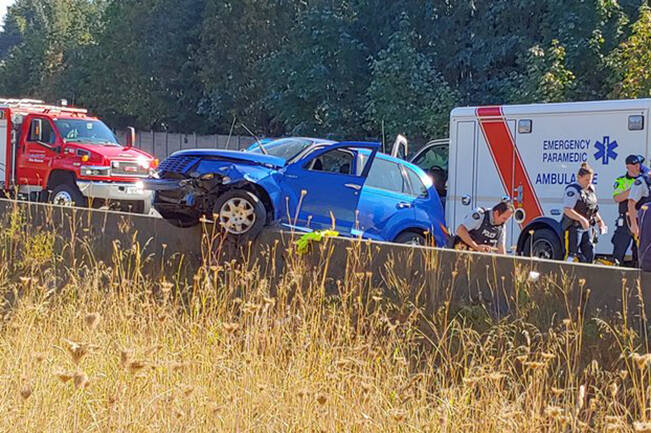 A driver was taken to hospital with unknown injuries after crashing into a barricade along the Nanaimo Parkway near the Mostar Road-Jingle Pot Road intersection on Wednesday, Sept. 21. (Chris Bush/News Bulletin)