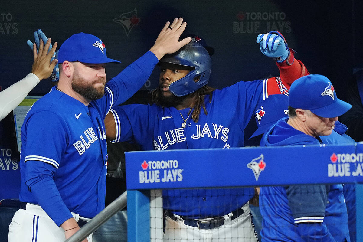 Toronto Blue Jays first baseman Vladimir Guerrero Jr. (27) celebrates his RBI sacrifice fly against the New York Yankees during sixth inning American League MLB baseball action in Toronto on Wednesday, September 28, 2022. THE CANADIAN PRESS/Nathan Denette