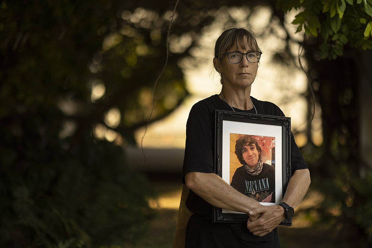 Jessica Michalofsky on the lawn in front of the Ministry of Health building in Victoria. Her son Aubrey Michalofsky died from drug overdose in Beasley, B.C., west of Nelson. Jessica is completing a marathon a day around the block every weekday in the hopes of getting a meeting with someone to discuss action for safe supply. Photo: Arnold Lim/Black Press Media