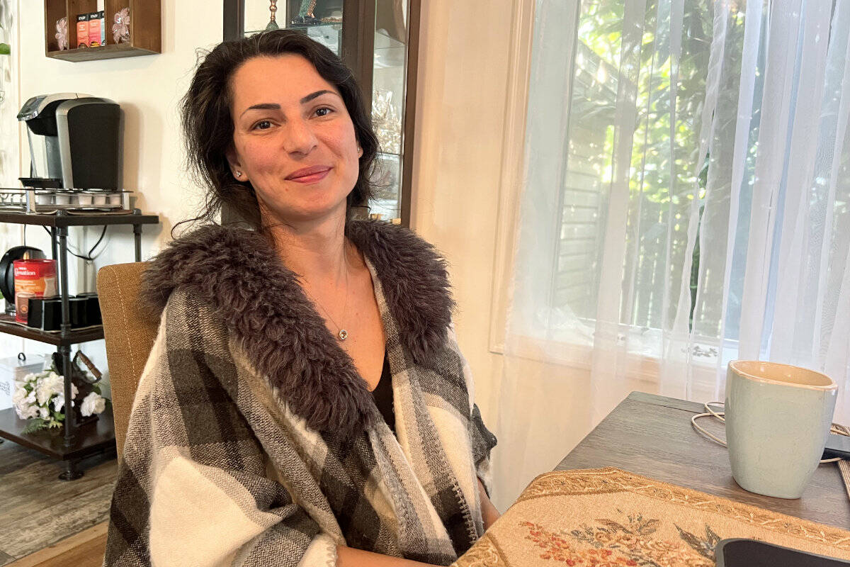 Ghazaleh Nozamani talking about the current protests in her home country of Iran at her house in Yarrow on Oct. 3, 2022. (Paul Henderson/ Chilliwack Progress)