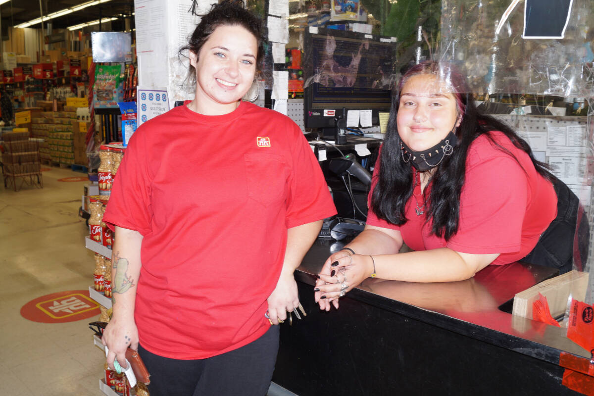 Brittany Bowers and Shelby Ens are part of a team at Sooke Home Hardware, where staffing is not a problem. (Rick Stiebel - Sooke News Mirror)