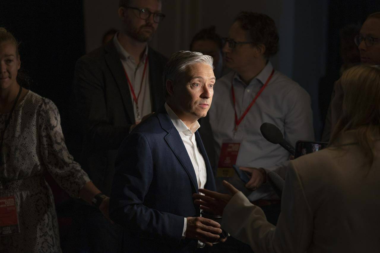 Minister of Innovation, Science and Industry Francois-Philippe Champagne speaks to reporters at the Liberal summer caucus retreat in St. Andrews, N.B. on September 13, 2022. When Innovation Minister François-Philippe Champagne gets in front a microphone these days to talk about electrifying Canada’s auto industry, he has a favourite line to sum up his efforts to attract global investment. “Not everyone in the world wakes up thinking about Canada,” he says. His job, as he sees it, is to change that. THE CANADIAN PRESS/Darren Calabrese