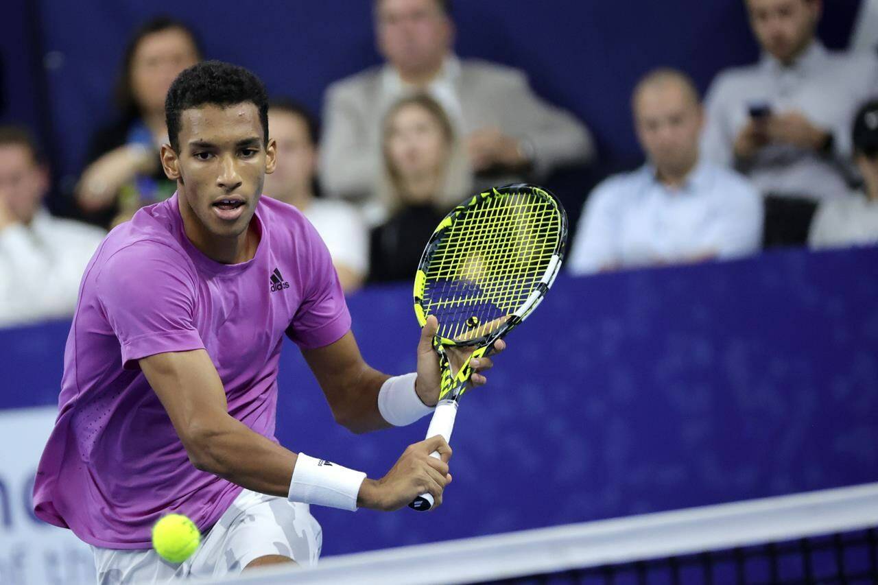 Canada’s Felix Auger-Aliassime returns the ball during the men’s singles final against Sebastian Korda of the United States at the European Open tennis tournament in Antwerp, Belgium, Sunday, Oct. 23, 2022. THE CANADIAN PRESS/AP-Olivier Matthys