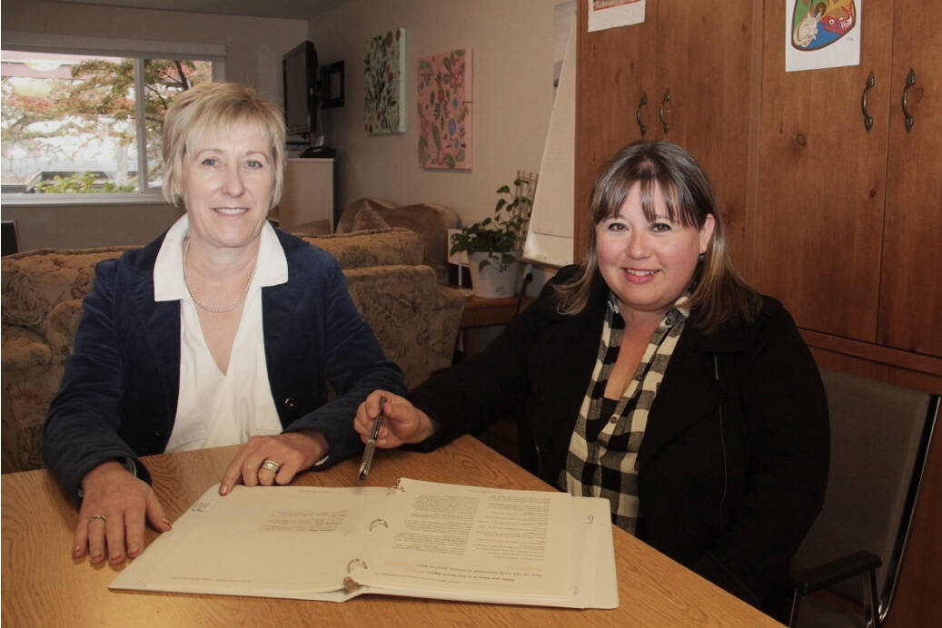 Linda Pityn and Candace Stretch start planning for winter programs at the Cridge Centre for the Family in Victoria. (Christine van Reeuwyk/News Staff)