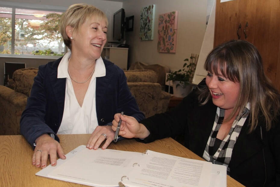 Linda Pityn and Candace Stretch start planning for winter programs at the Cridge Centre for the Family in Victoria. (Christine van Reeuwyk/News Staff)