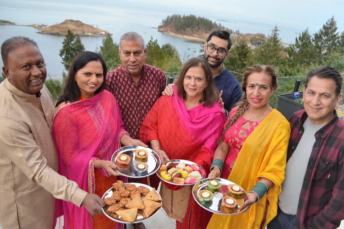Raj Banga, left, Sunita Banga, Jeet Manhas, Kaajal Manhas, Arjan Manhas, Shashi Monga and Peter Monga all meet together as part of the community organizing committee for the Beban Park social centre Diwali celebration. (Mandy Moraes/News Bulletin)