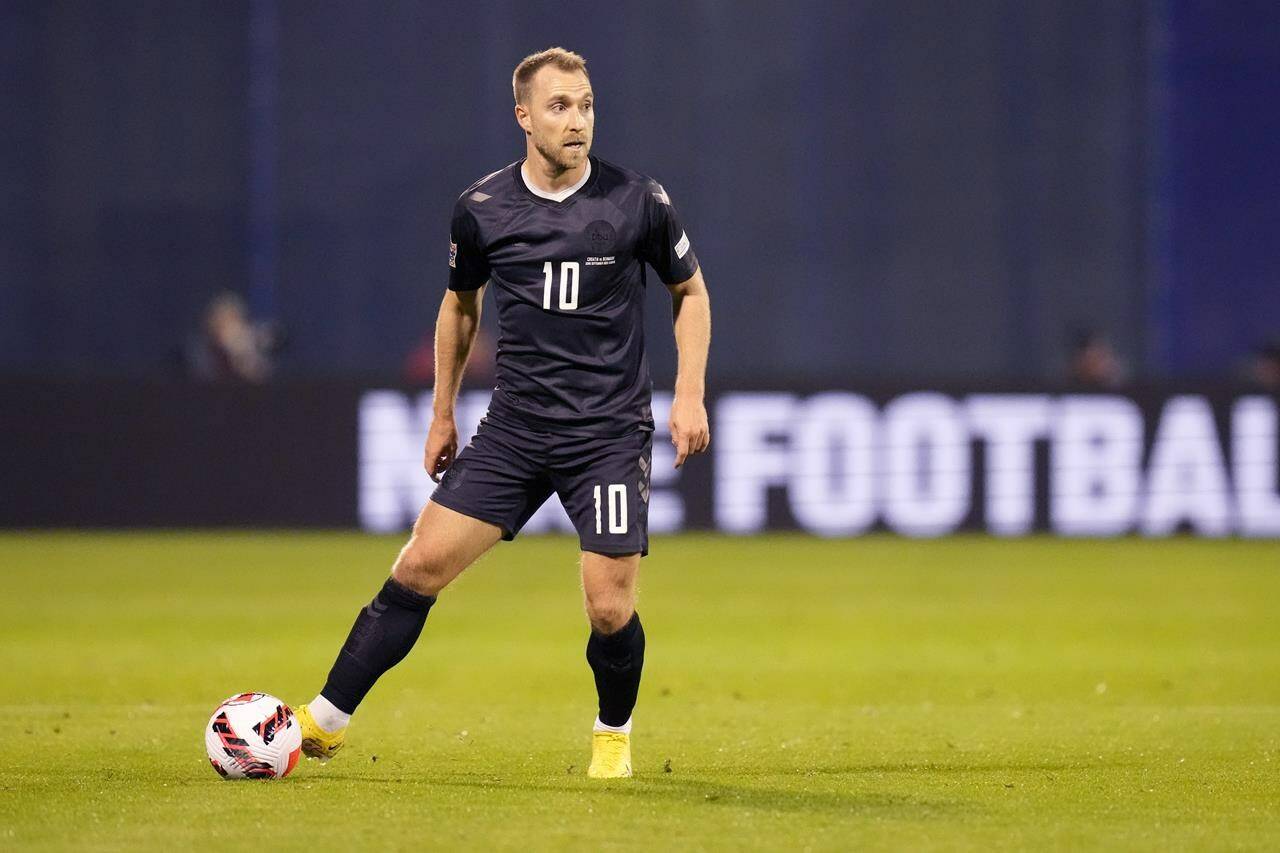 Denmark’s Christian Eriksen in action during the UEFA Nations League soccer match between Croatia and Denmark at the Maksimir stadium in Zagreb, Croatia, on Sept. 22, 2022. Denmark will wear team jerseys at the World Cup that protest the human rights record of host nation Qatar, with a black option to honor migrant workers who died during construction work for the tournament. “The color of mourning,” kit manufacturer Hummel said when releasing the black third-choice design. (AP Photo/Darko Bandic)