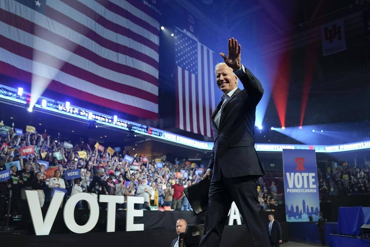 President Joe Biden waves as he walks off stage after speaking at a campaign rally for Pennsylvania’s Democratic gubernatorial candidate Josh Shapiro and Democratic Senate candidate Lt. Gov. John Fetterman, Saturday, Nov. 5, 2022, in Philadelphia. (AP Photo/Patrick Semansky)